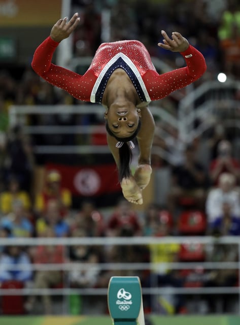 Biles’ run at Olympic history ends with bronze on the beam