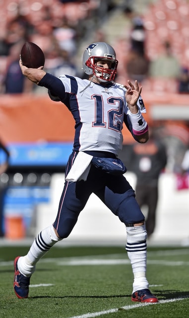 Pumped up: Brady passes for 406 yards in return for Patriots